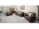 Inviting living room leading to the kitchen and dining area at 4651 Oakleigh Manor Dr, Powder Springs, GA 30127