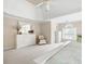 Large main bedroom features a vaulted ceiling, carpeted floor, and bright windows at 4651 Oakleigh Manor Dr, Powder Springs, GA 30127