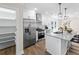 Bright kitchen with stainless steel appliances, a pantry, and granite counters at 5068 Maple Dr, Forest Park, GA 30297