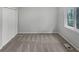 Well-lit bedroom with a window and closet for ample storage at 5808 Trent Walk Dr, Lithonia, GA 30038