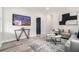 Bright living room boasting modern art, neutral furniture, and plank flooring at 789 Chestnut Place Nw, Atlanta, GA 30314