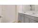 Bathroom with double vanity and soft gray cabinets at 2713 Serena Way, South Fulton, GA 30331