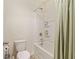 Bathroom featuring a shower-tub combo with decorative curtain at 2713 Serena Way, South Fulton, GA 30331