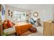 Bright bedroom with a window view, a cozy bed, and desk work area at 2713 Serena Way, South Fulton, GA 30331