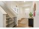 Home foyer features hardwood floors, a staircase, and convenient access to living spaces at 2713 Serena Way, South Fulton, GA 30331