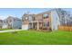 Attractive two-story home showcases a brick facade, a well-groomed lawn, and a two-car garage at 2713 Serena Way, South Fulton, GA 30331