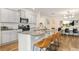 Modern kitchen with gray cabinets, granite countertops, and a convenient breakfast bar area at 2713 Serena Way, South Fulton, GA 30331