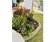 Beautiful landscaping with vibrant rose bushes and lush greenery adding curb appeal to the home at 2713 Serena Way, South Fulton, GA 30331