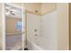 Bright bathroom features a soaking tub and shower with white tile surround at 2147 Red Oak Cir, Union City, GA 30291