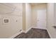 This laundry room features dark wood floors and a wire rack at 2147 Red Oak Cir, Union City, GA 30291