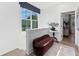 Bright hallway featuring hardwood floors and a cozy seating nook by a large window at 2637 Mackintosh Ct # 8, Brookhaven, GA 30319