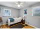 Comfortable bedroom with hardwood floors, natural light, and neutral paint, perfect for relaxation and rest at 3180 Vine Cir, Decatur, GA 30033