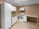 Kitchen featuring white cabinetry, stainless steel oven, and counter space at 4441 Prather Son Dr, Loganville, GA 30052