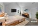 Well-lit main bedroom featuring a vaulted ceiling and modern furnishings at 4441 Prather Son Dr, Loganville, GA 30052