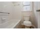 Full bathroom with tiled shower and wood-look floors at 1521 Reids Ferry Way, Marietta, GA 30062