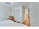 Bedroom featuring closet and wooden floor at 4110 Sinclair Shores Rd, Cumming, GA 30041