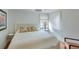 Bedroom featuring white bed and wooden floor at 4110 Sinclair Shores Rd, Cumming, GA 30041