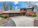 Stunning two-story wood home featuring an oversized three-car garage and circular driveway at 4110 Sinclair Shores Rd, Cumming, GA 30041