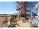 Relaxing backyard featuring a stone patio with a white swing and lovely neighborhood views at 515 Windy Ridge Ct, Canton, GA 30114