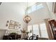 Dining room with elegant light fixture and large windows at 515 Windy Ridge Ct, Canton, GA 30114