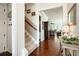 Entry way with hard wood floors, staircase, and elegant decor at 515 Windy Ridge Ct, Canton, GA 30114