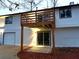 Rear view of the house featuring a wooden porch at 5729 Rock Rd, Union City, GA 30291