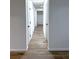 Hallway featuring modern floors and doors at 5729 Rock Rd, Union City, GA 30291