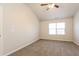 Cozy bedroom with vaulted ceiling and carpet flooring at 8542 Lakemeadow Dr, Union City, GA 30291