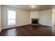 Bright living room with fireplace and beautiful hardwood floors at 8542 Lakemeadow Dr, Union City, GA 30291