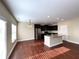 Well-lit kitchen featuring stainless steel appliances, granite countertops, and dark wood cabinetry at 2378 Misty Ivy Ct, Buford, GA 30519