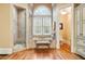 Bathroom with soaking tub, walk-in shower, and linen closet at 3201 Hobsons Ridge Nw Trl, Acworth, GA 30101