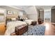 A furnished bedroom with two beds, wooden trunks, and a patterned rug at 3201 Hobsons Ridge Nw Trl, Acworth, GA 30101