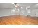 Large bonus room featuring hardwood floors, vaulted ceilings, and natural light through a window at 3201 Hobsons Ridge Nw Trl, Acworth, GA 30101