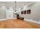 Spacious bonus room featuring hardwood floors, white trim, and recessed lighting at 3201 Hobsons Ridge Nw Trl, Acworth, GA 30101