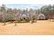 Stately brick home with a welcoming front porch and manicured landscaping at 3201 Hobsons Ridge Nw Trl, Acworth, GA 30101
