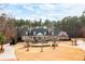 Charming home with a circular driveway and well-maintained landscaping at 3201 Hobsons Ridge Nw Trl, Acworth, GA 30101