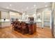 Gourmet kitchen with a large island, seating, and stainless steel appliances, ideal for entertaining at 3201 Hobsons Ridge Nw Trl, Acworth, GA 30101