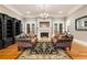 Elegant living room with hardwood floors, fireplace, and stylish furnishings; great for entertaining or relaxing at 3201 Hobsons Ridge Nw Trl, Acworth, GA 30101