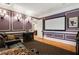 Home theater room with leather seating and projector screen at 3201 Hobsons Ridge Nw Trl, Acworth, GA 30101