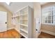 Bright walk-in closet with shelving and a window for natural light at 3201 Hobsons Ridge Nw Trl, Acworth, GA 30101