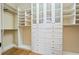 Custom closet with drawers, shelving and hanging racks at 3201 Hobsons Ridge Nw Trl, Acworth, GA 30101