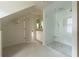 Bright bathroom with glass shower, modern fixtures, and shiplap wall detail at 4000 Conway Valley Nw Rd, Atlanta, GA 30327