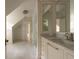 Bright bathroom featuring marble countertops, shaker cabinets, and modern fixtures at 4000 Conway Valley Nw Rd, Atlanta, GA 30327