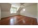 Bedroom featuring hardwood floors, large windows and octagonal window at 4000 Conway Valley Nw Rd, Atlanta, GA 30327