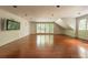 Large bonus room with hardwood floors and natural light at 4000 Conway Valley Nw Rd, Atlanta, GA 30327