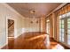 Formal dining room with hardwood floors, wainscoting, chandelier, and backyard access at 4000 Conway Valley Nw Rd, Atlanta, GA 30327