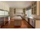 Bright kitchen featuring stainless steel appliances, a granite island, and ample cabinet space at 4000 Conway Valley Nw Rd, Atlanta, GA 30327