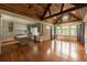 Spacious kitchen and great room, vaulted wood ceilings, and a large kitchen island at 4000 Conway Valley Nw Rd, Atlanta, GA 30327