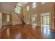 A spacious living room featuring hardwood floors, wainscoting, and natural light at 4000 Conway Valley Nw Rd, Atlanta, GA 30327