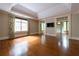 Large main bedroom with tray ceiling and hardwood floors at 4000 Conway Valley Nw Rd, Atlanta, GA 30327